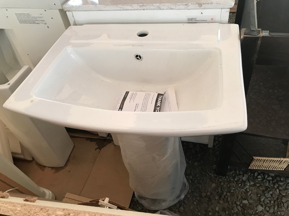 Pedestal sink w/ base; top has damage