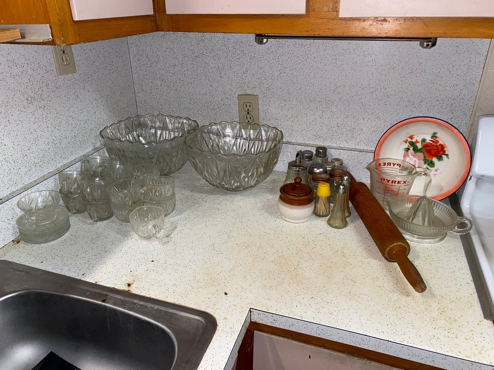 Punchbowls, salt and pepper shakers, rolling pin and juicer