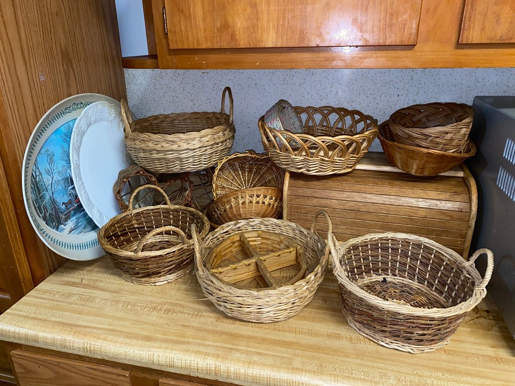 Collection of baskets and wooden bread box