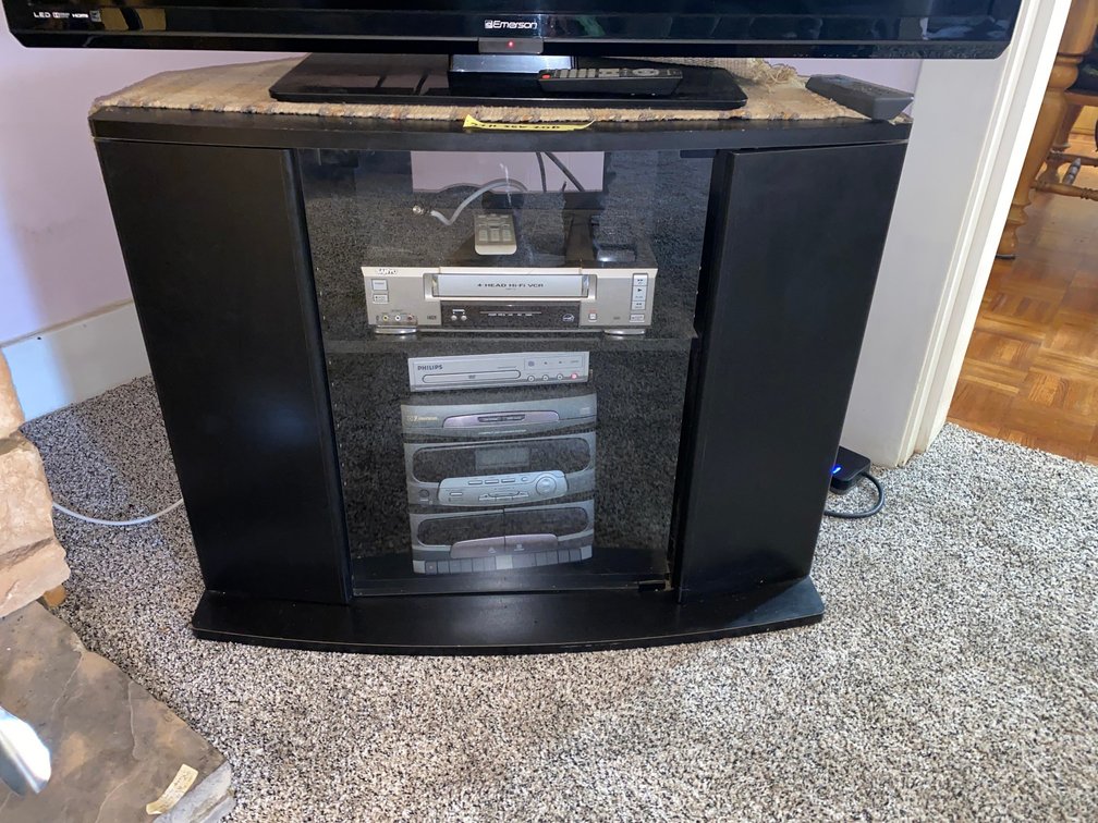 Sanyo 4-head Hi-Fi VCR machine, Philips DVD player w/ controllers, cabinet
