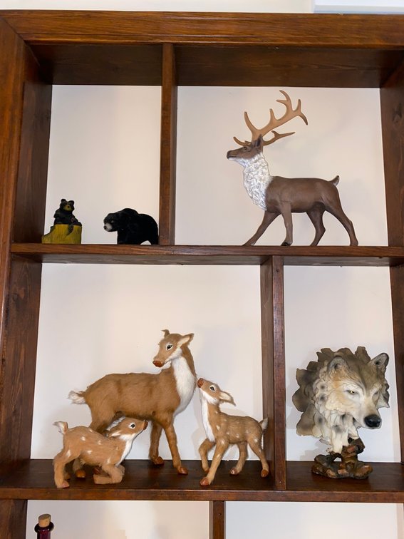 Decorative statues of deer and other outdoor animals