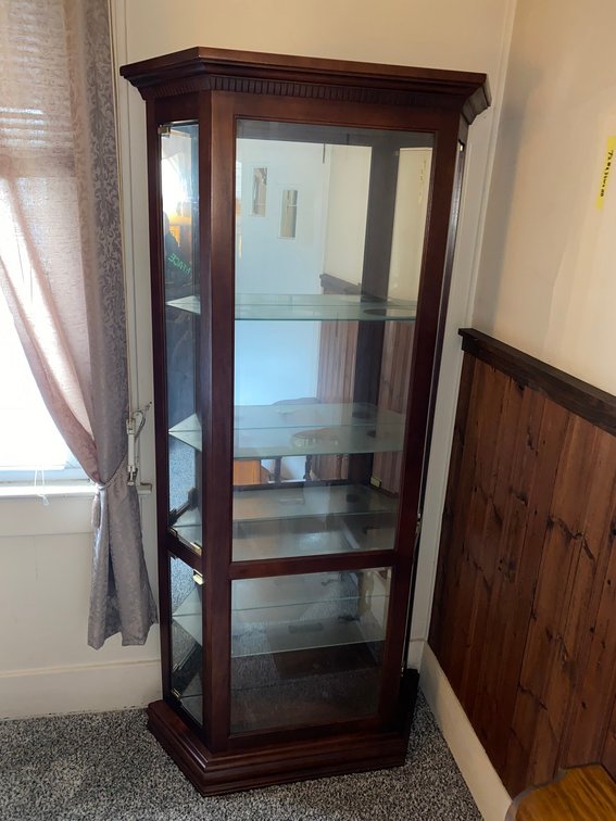 Lighted showcase w/ beveled glass
