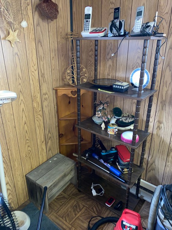 2 Shelves w/ contents, small wooden stool, corner shelf and decorative items on the wall