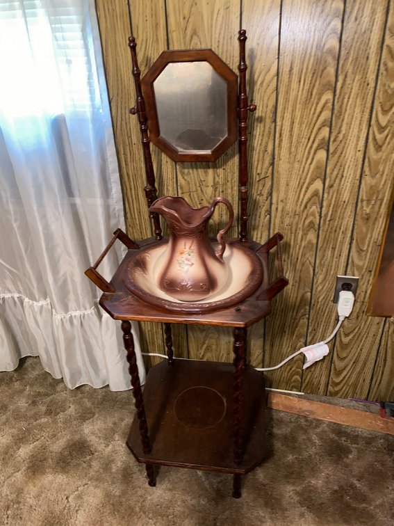 Pitcher and bowl in stand