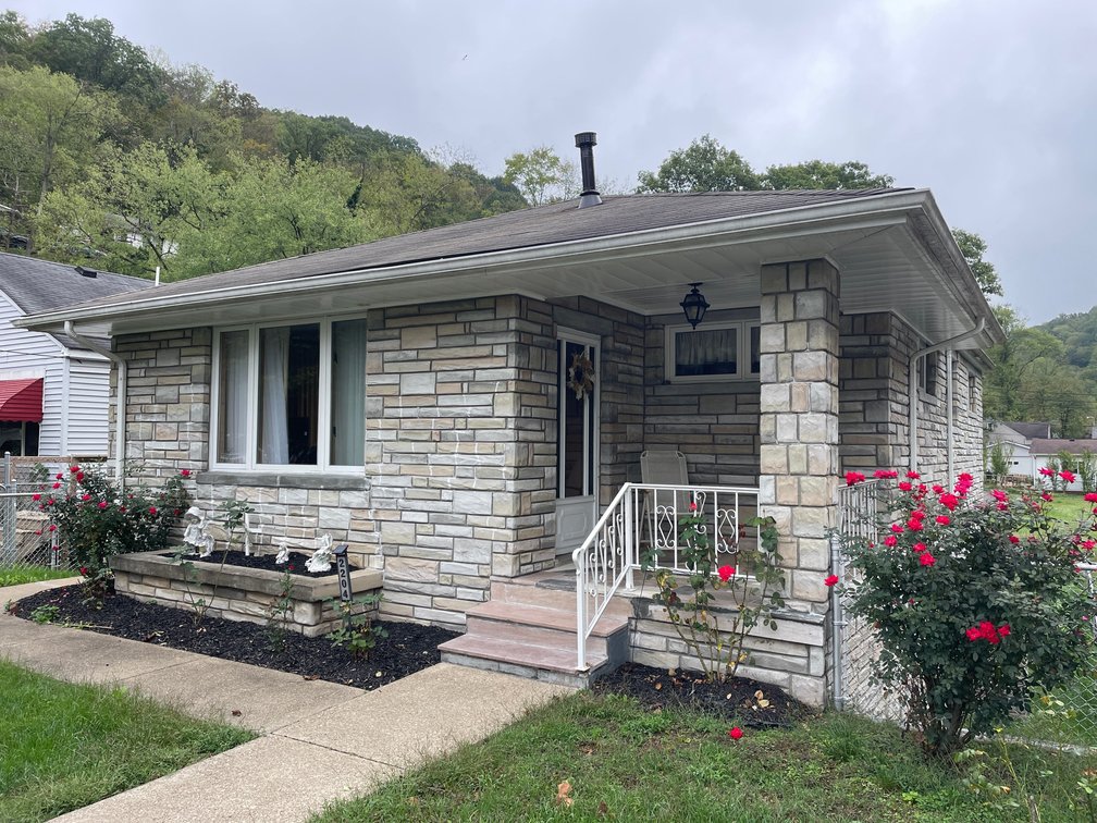 Image for SOLD $81,950 - Move-in Ready Stone Ranch with Full Basement