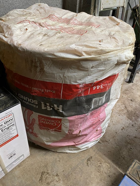 Roll of fiberglass insulation
