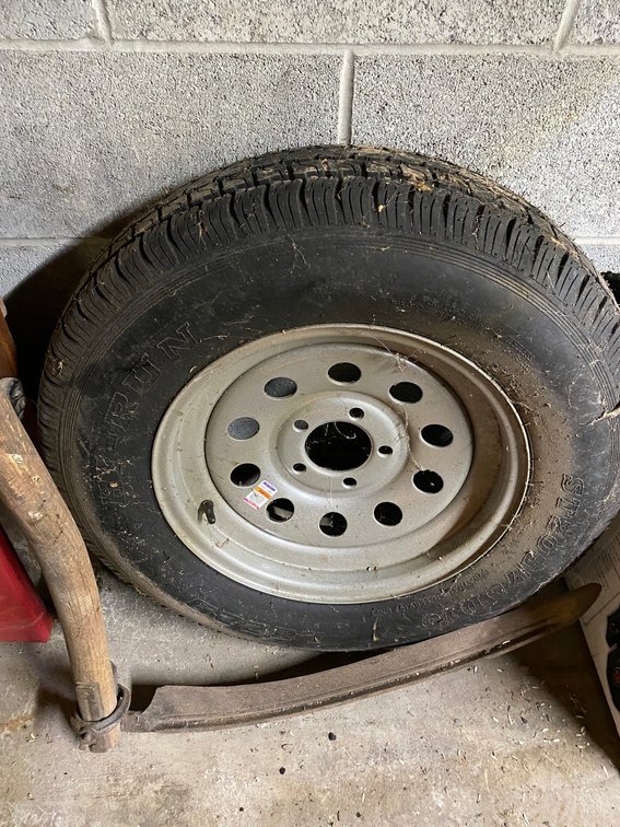 Trailer tire and scythe 