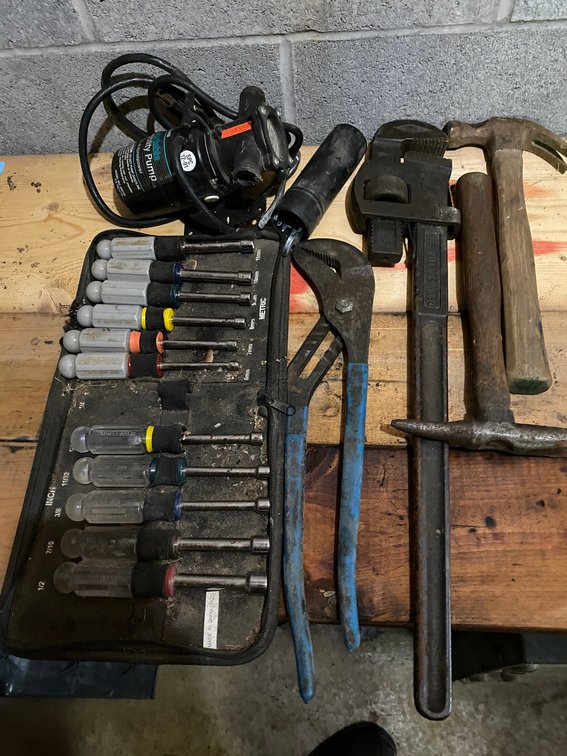 Nut drivers, pliers, tools and small sump pump