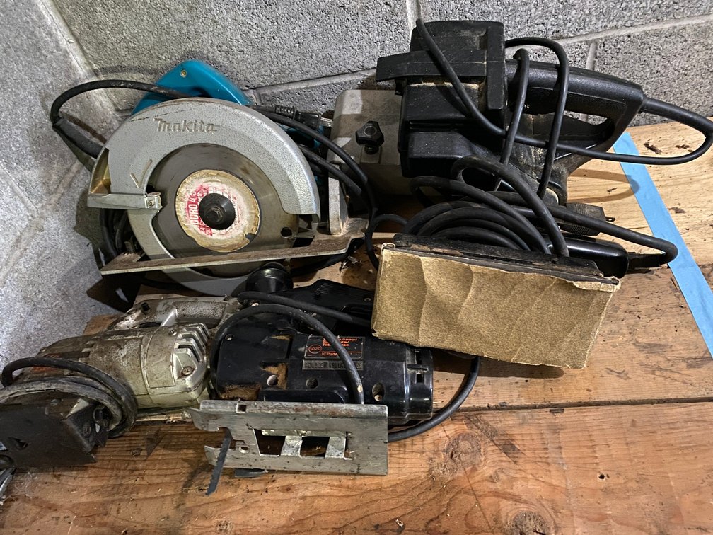 Makita circular saw, belt sander, jigsaws and a palm sander