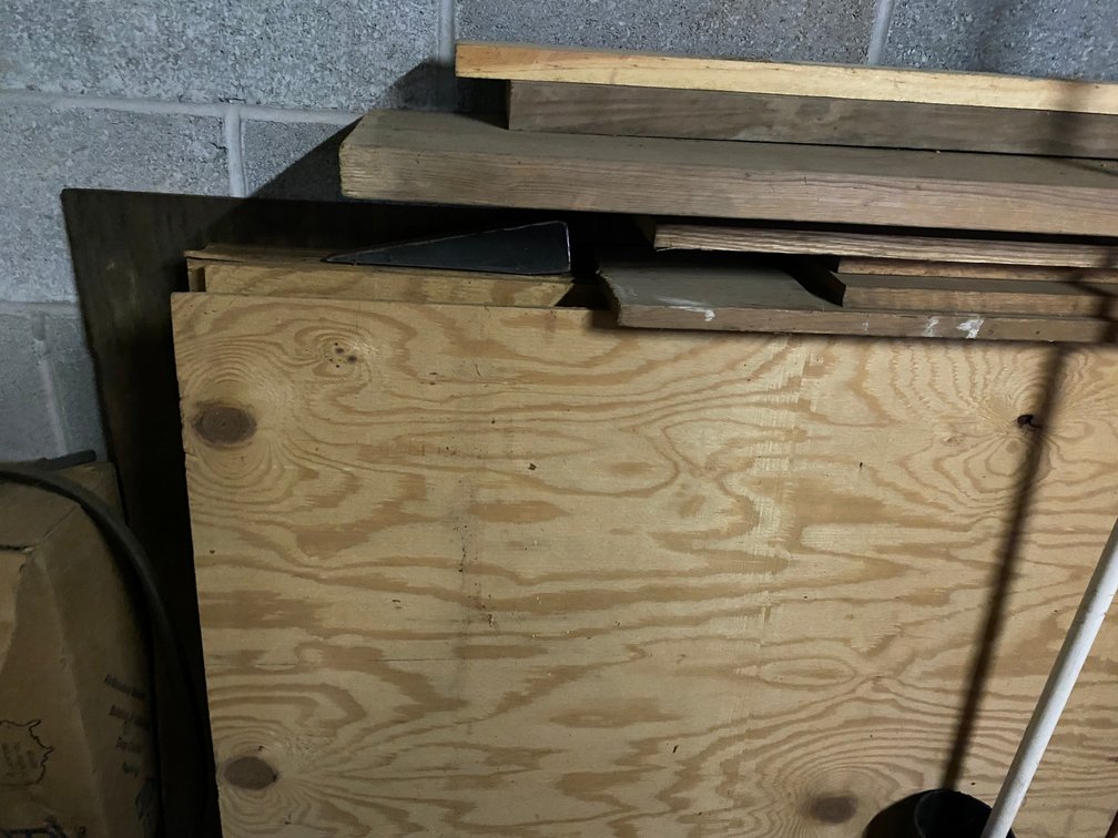 Several 4x8 sheets of plywood
