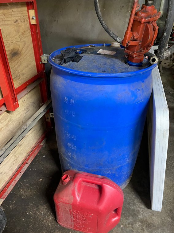 Drum and pump, contents unknown