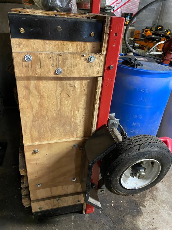 Little pull behind cart for a trailer loaded w/ wood