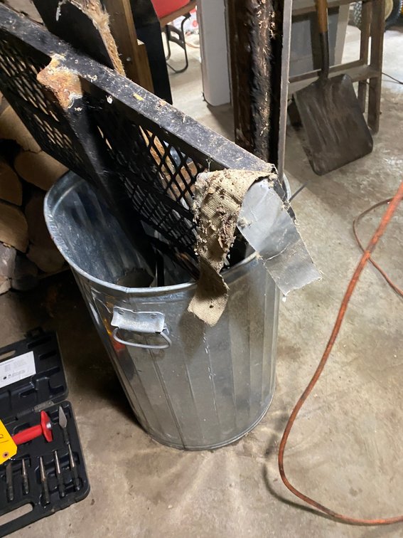 Trash can w/ assorted scrap