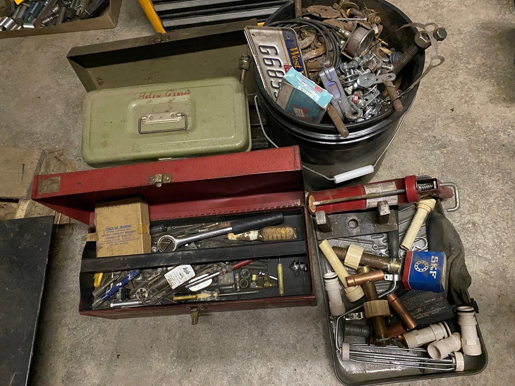 Assortment of hardware in a bucket, tool chest w/ some copper and a few tools