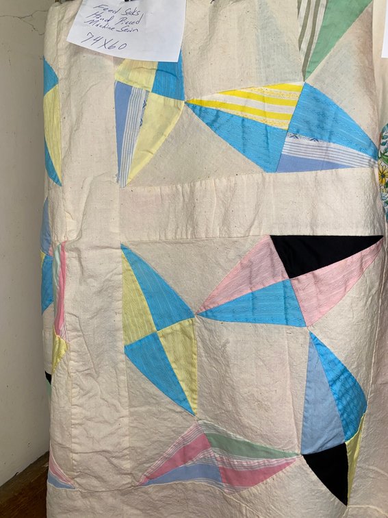 Handstitched and machine sewn quilt top