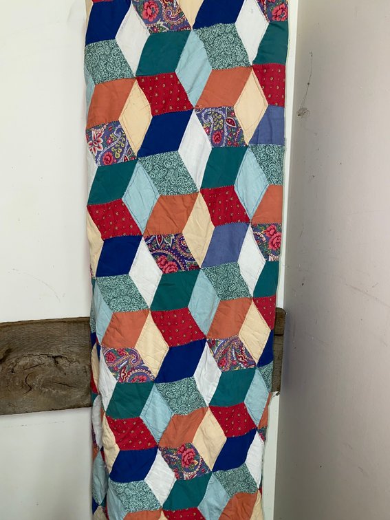 Quilt w/ damage