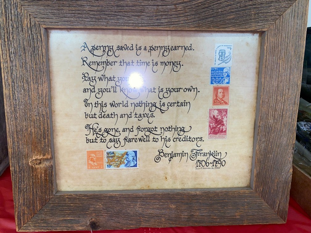 Framed print w/ stamps and Benjamin Franklin quote