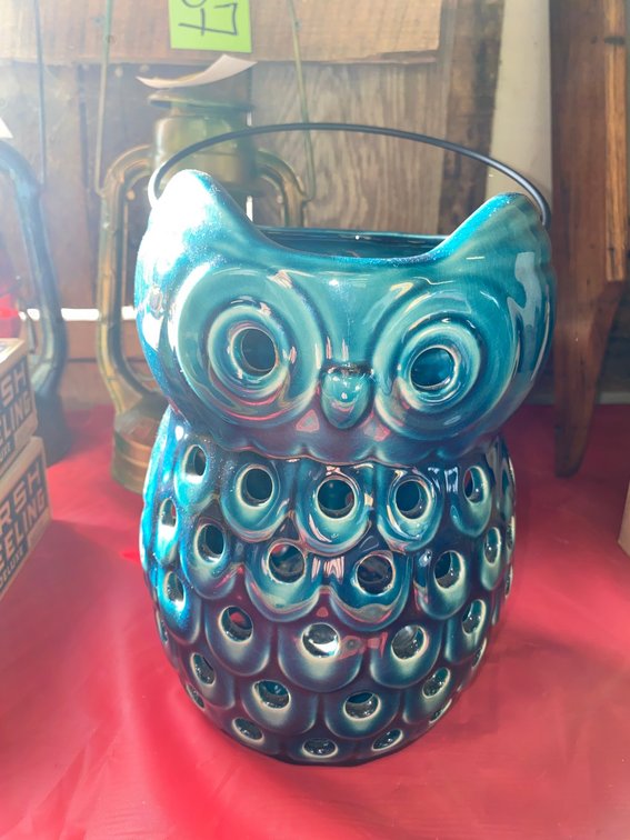 Perforated owl candle holder