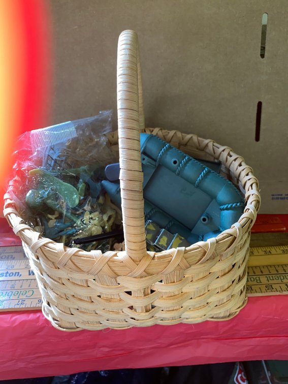 Toy soldiers in a basket