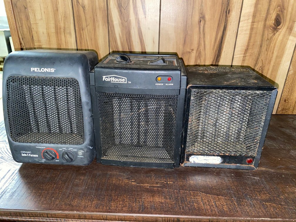 Three small heater and a new baseboard heater
