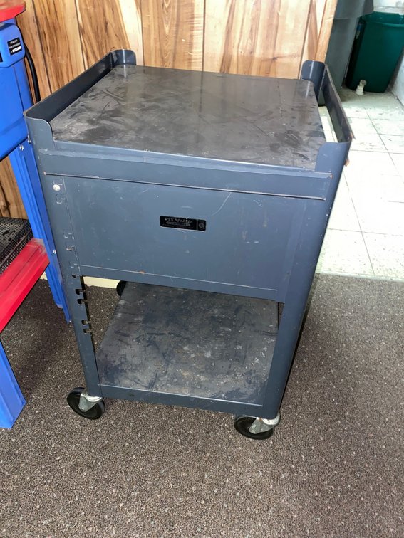 Small metal cart on wheels