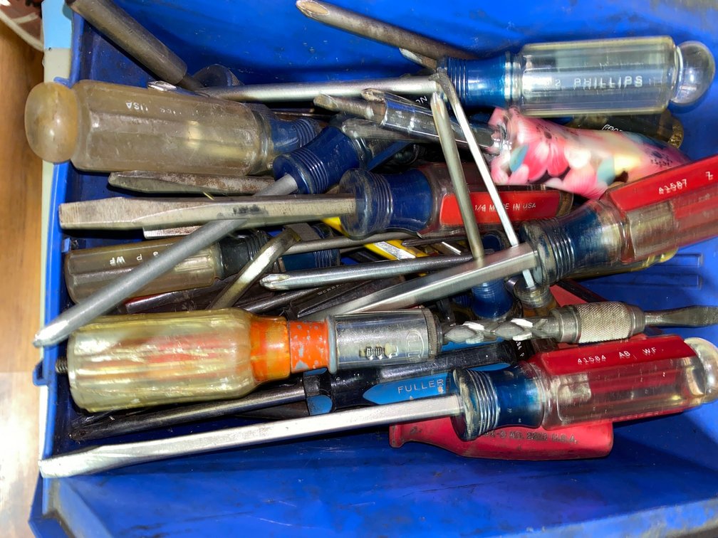 Container of screwdrivers