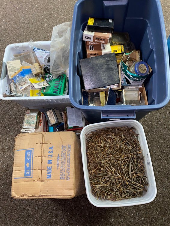 Tote, a couple buckets and box of nails 