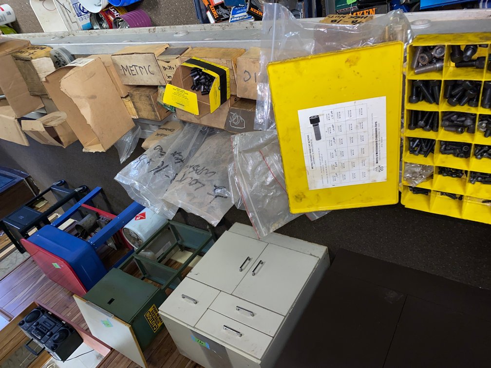 Assortment of hardware and metric nuts and bolts