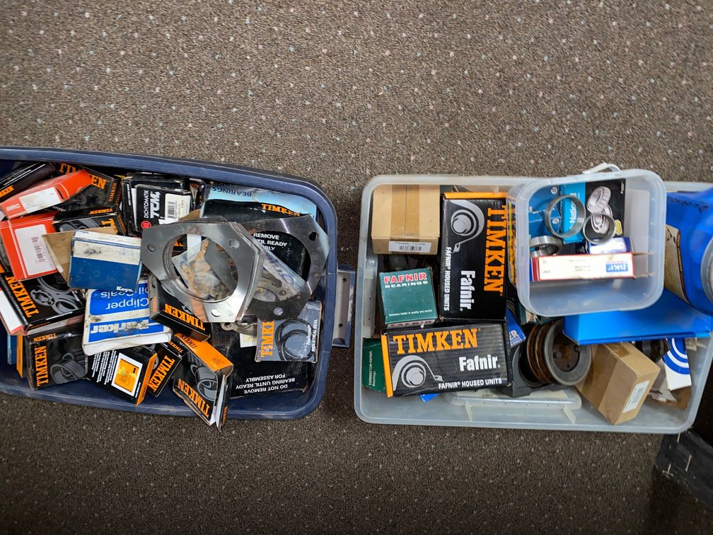 Two containers of assorted bearings