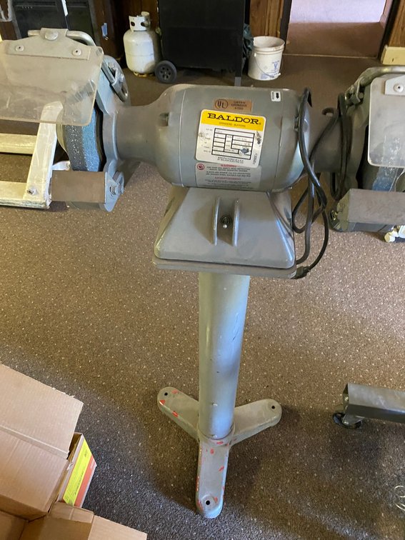 Bench grinder with stand