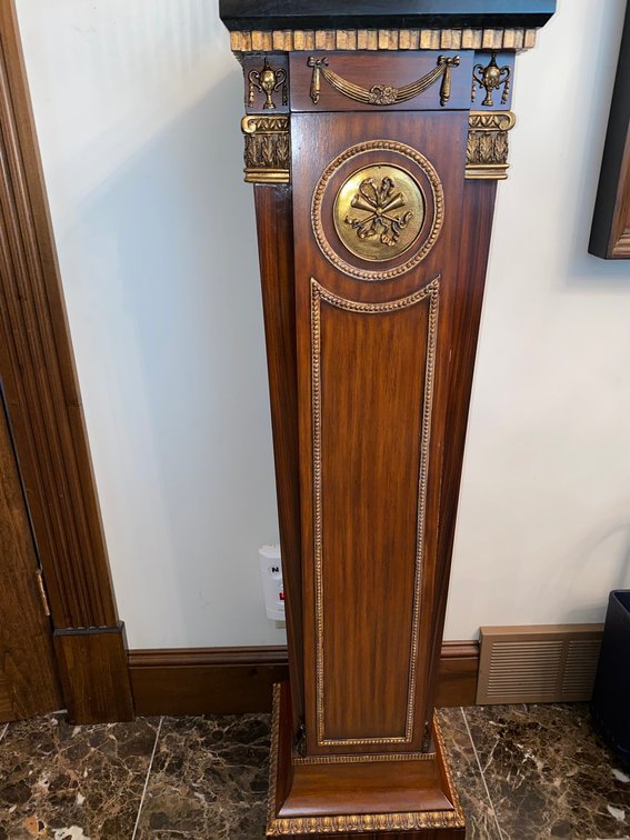 Contemporary pedestal with stone top over brass mounted base
