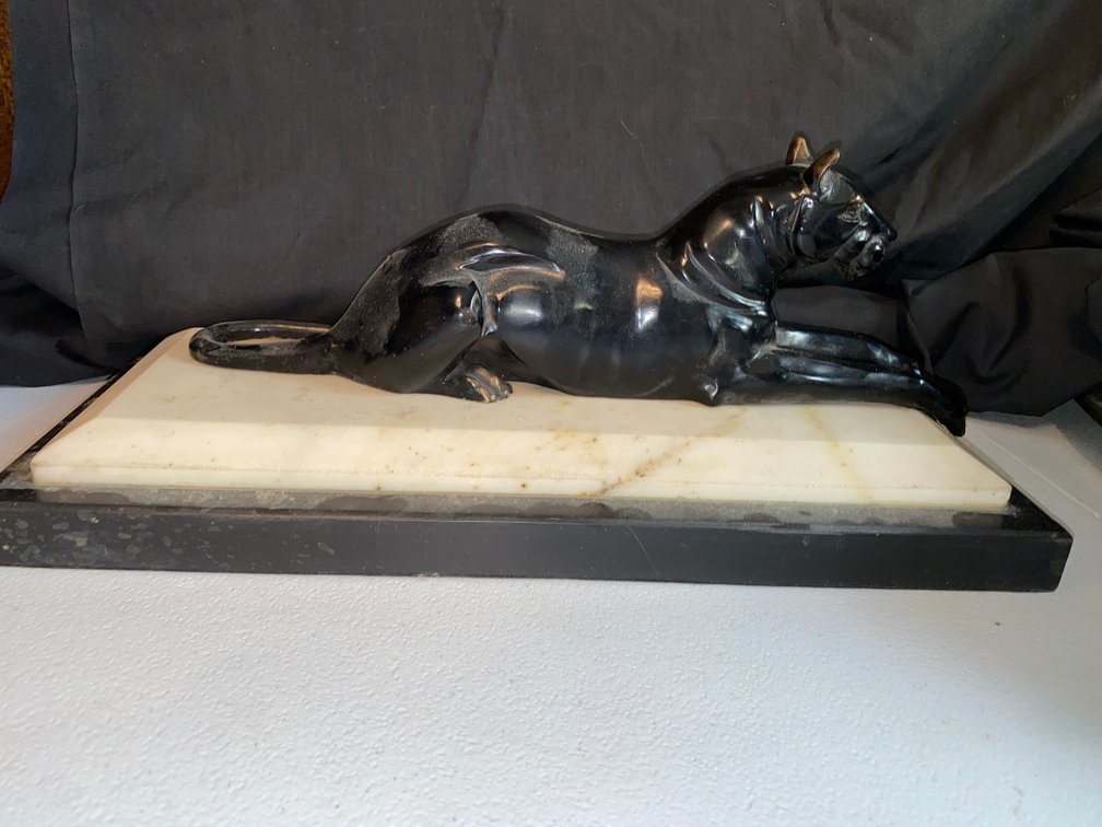 Bronze cat on marble base