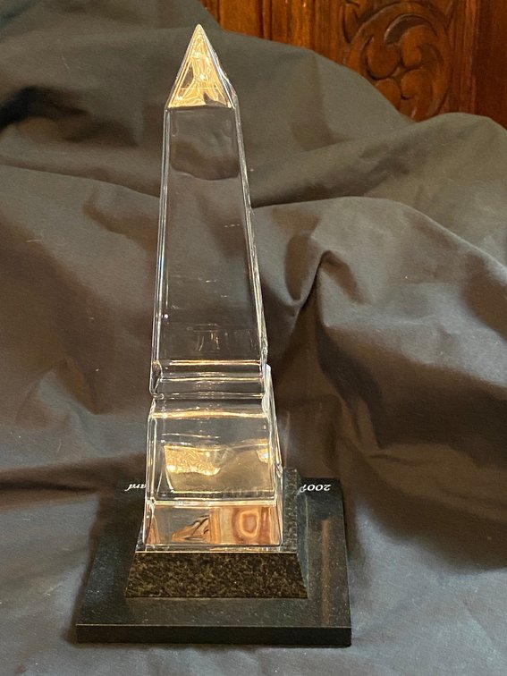Steuben Glass obelisk with black lacquered base in the original box