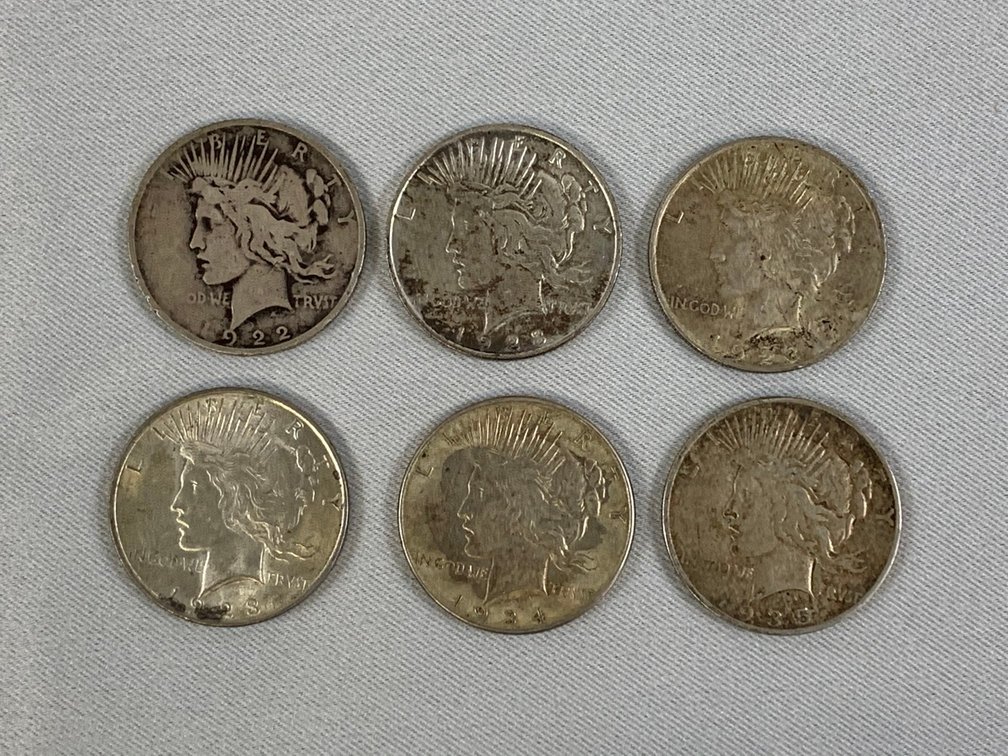 Six Peace Dollars