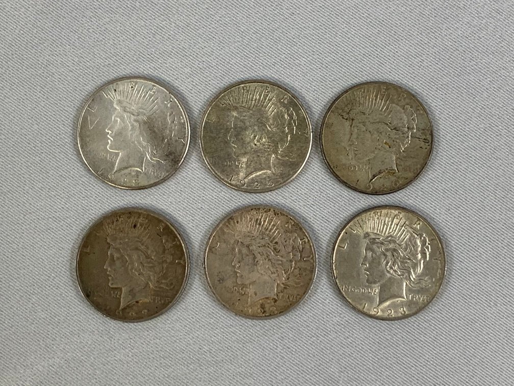 Six Peace Dollars