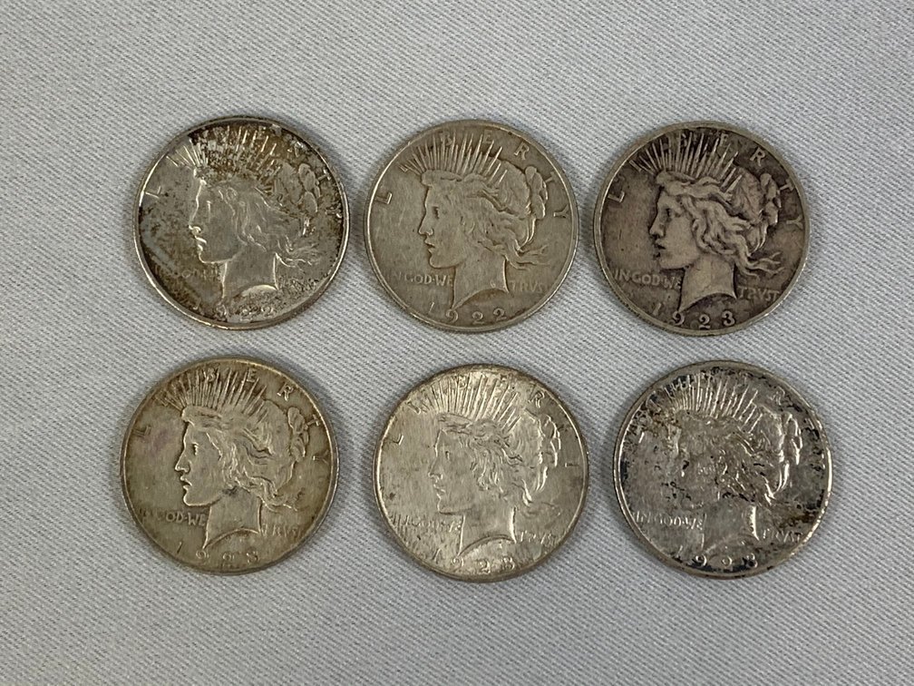 Six Peace Dollars