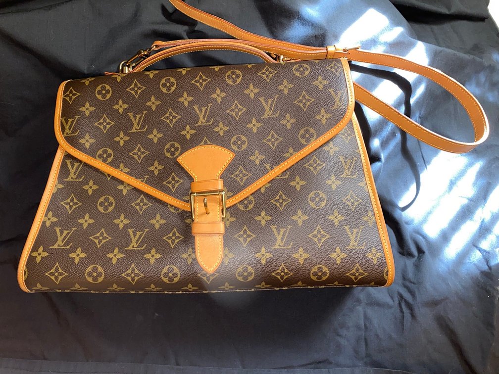 Louis Vuitton satchel with strap
