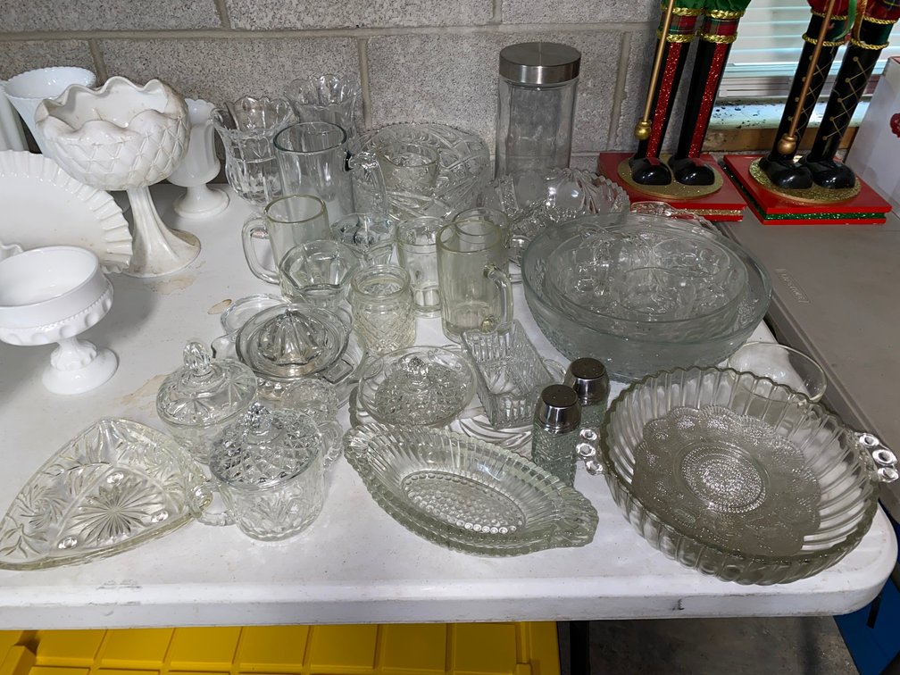 Clear glass serving dishes, glasses, pitchers