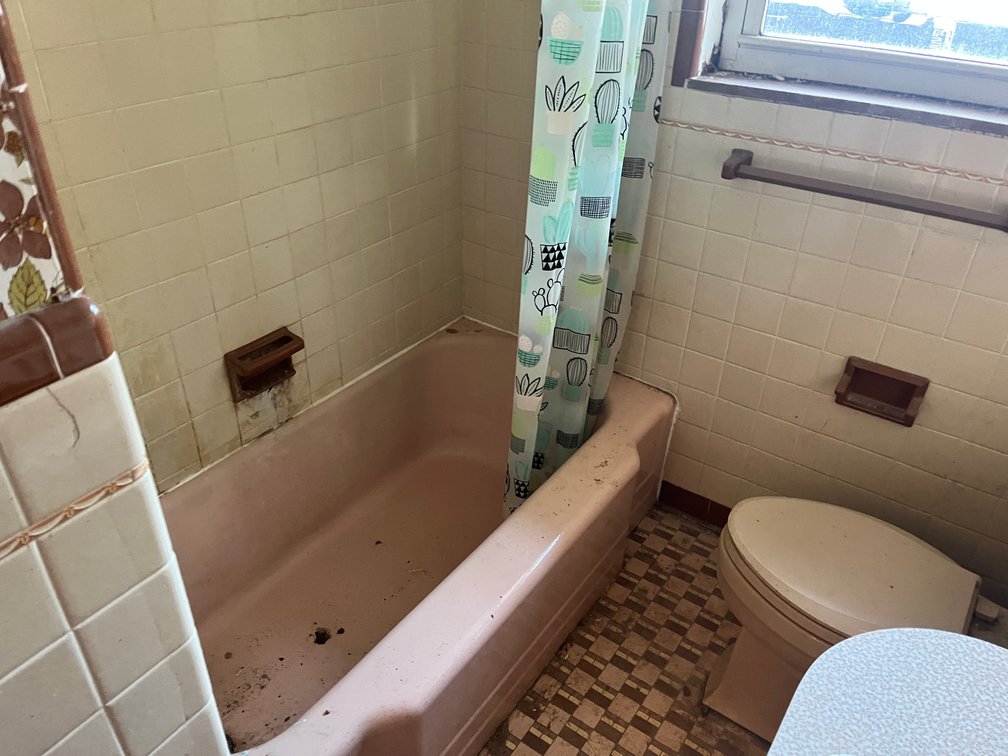 Image for SOLD $129,800 - Brick 3 Bedroom with 2 Garages in Huntington
