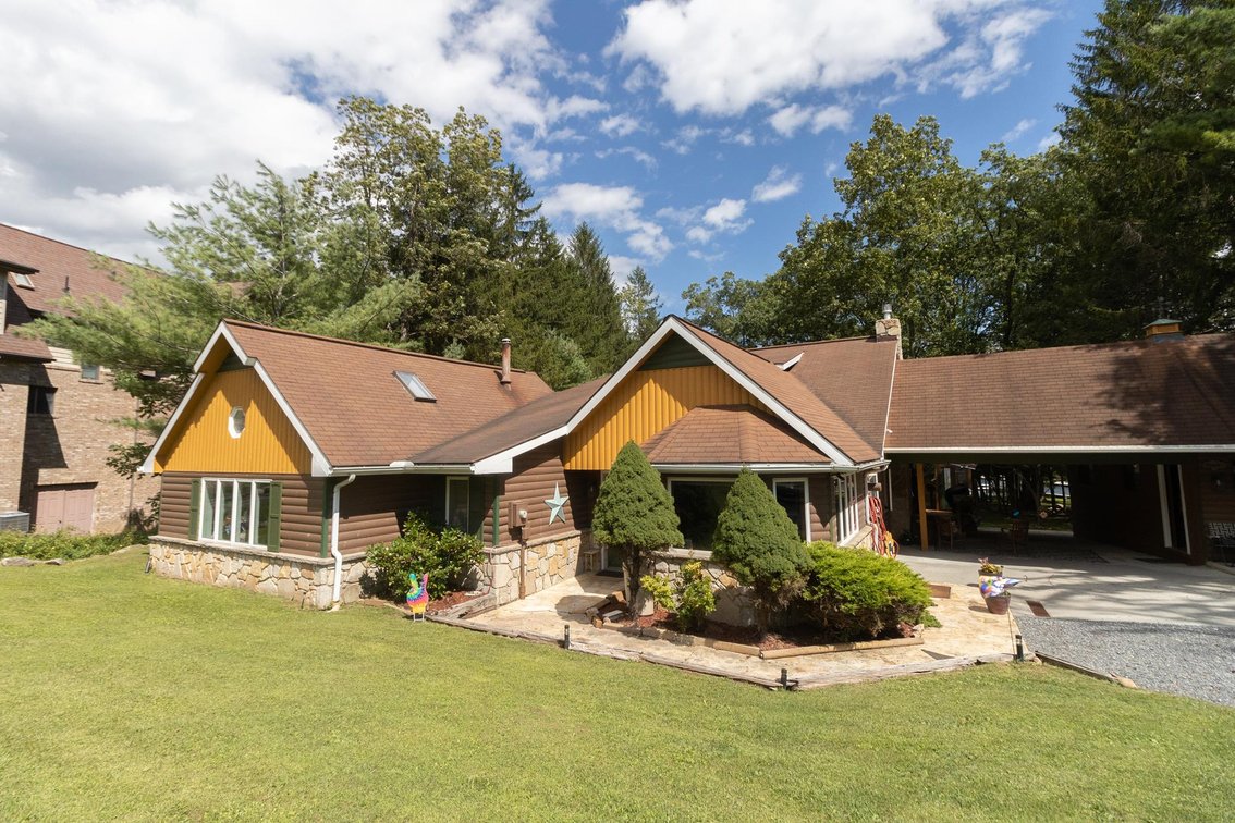 Image for SOLD $1,485,000 - Deep Creek Lakefront Home on a Spacious Lot with Flexible Zoning
