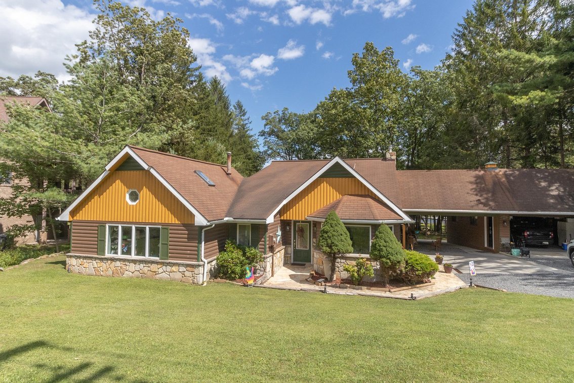 Image for SOLD $1,485,000 - Deep Creek Lakefront Home on a Spacious Lot with Flexible Zoning