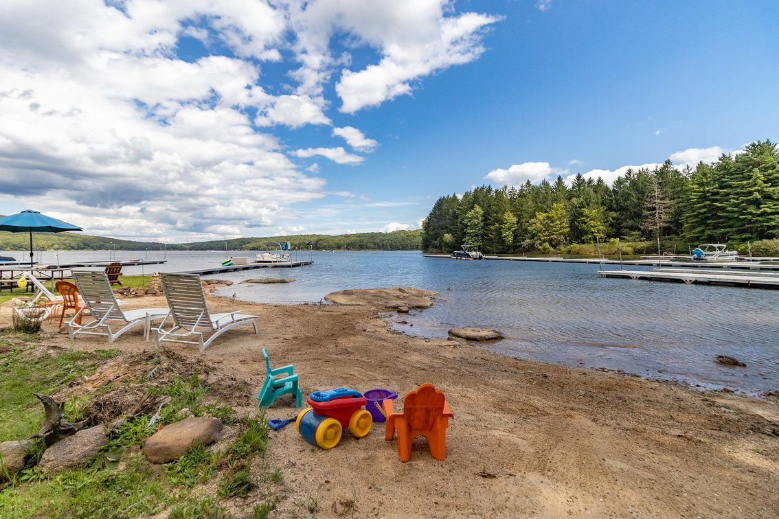 Image for SOLD $1,485,000 - Deep Creek Lakefront Home on a Spacious Lot with Flexible Zoning
