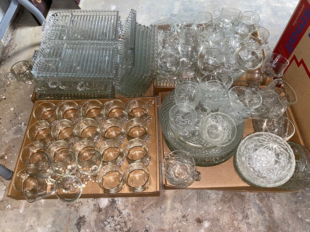 Clear glass tea cups and serving dishes