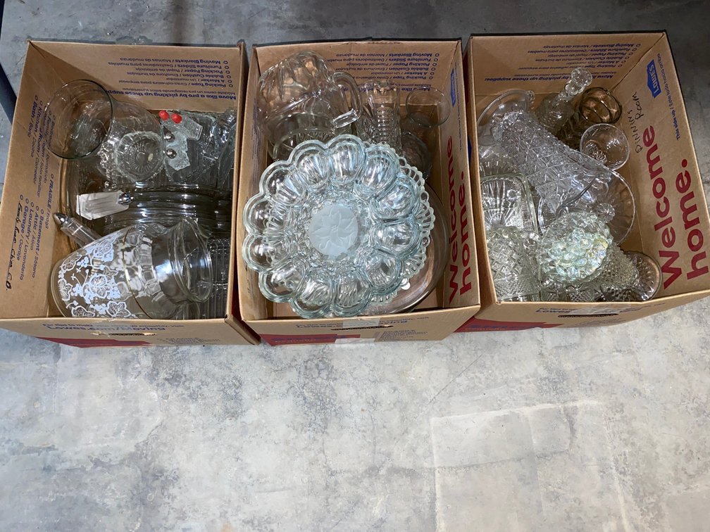 Clear glass egg trays, vases and pitcher