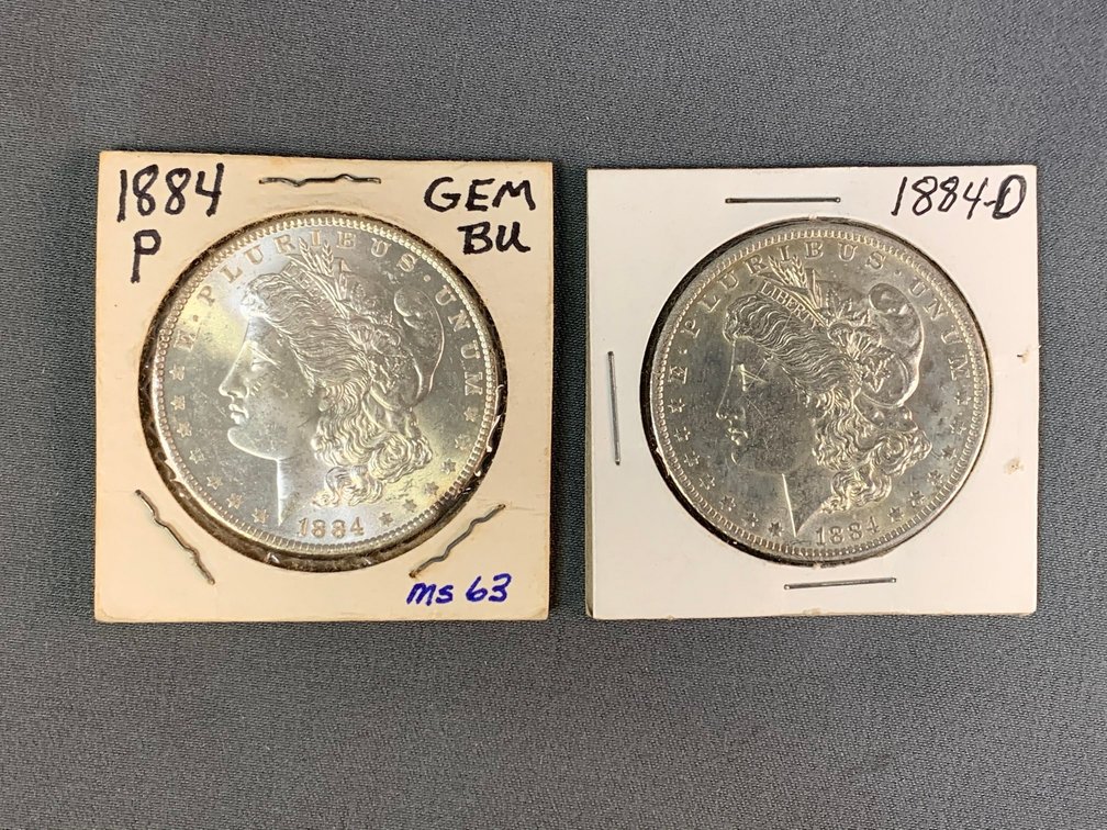 (2) 1884 Morgan Dollars