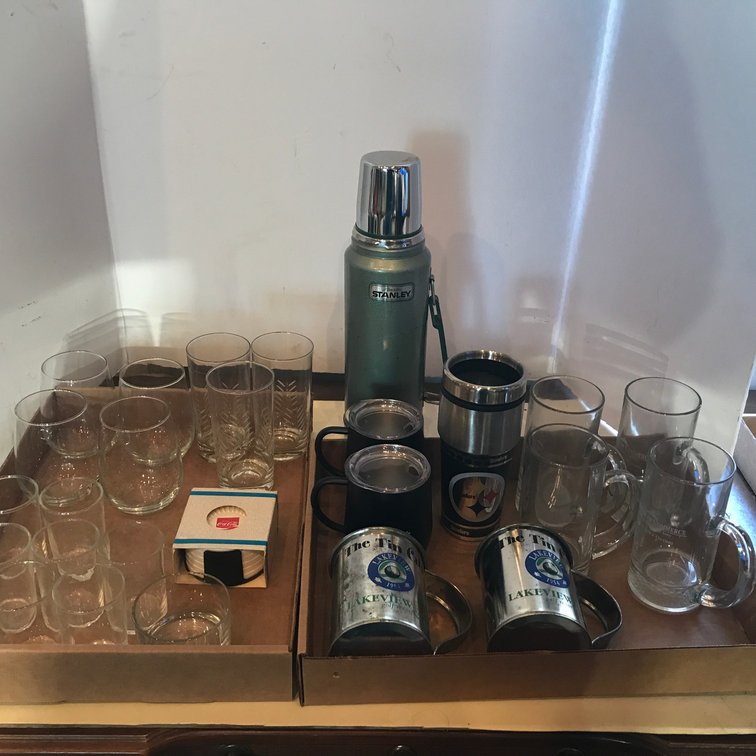 Assortment of glasses, thermos