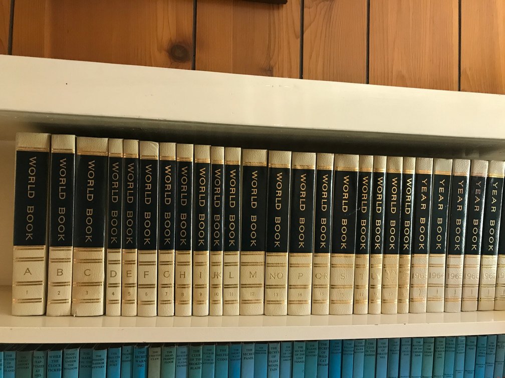 Set of World Book Encyclopedias, World Book Dictionaries, and World Book Atlas