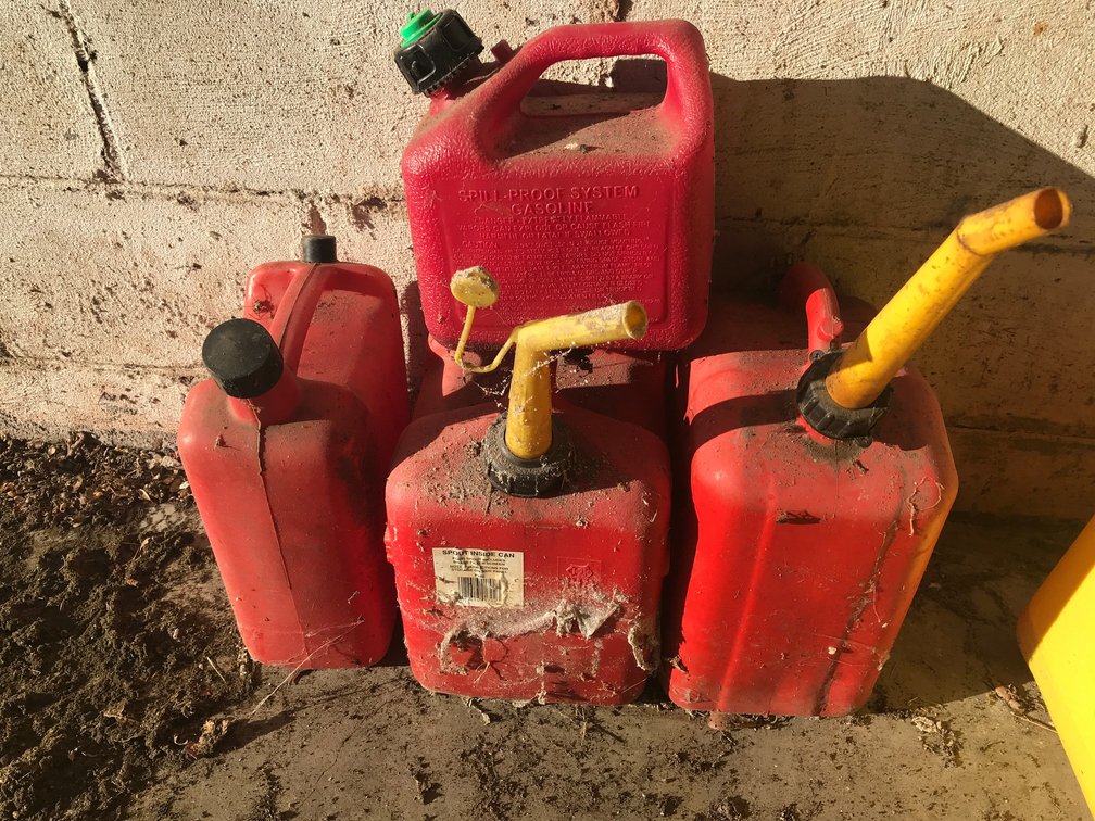 4 Empty fuel cans