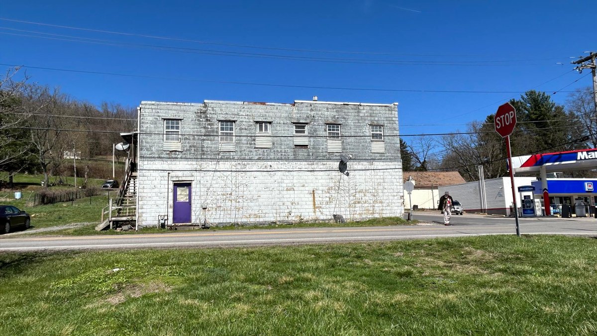 Image for SOLD $63,800 - Commercial Building with Garage Bays & Apartment Selling to the Highest Bidder