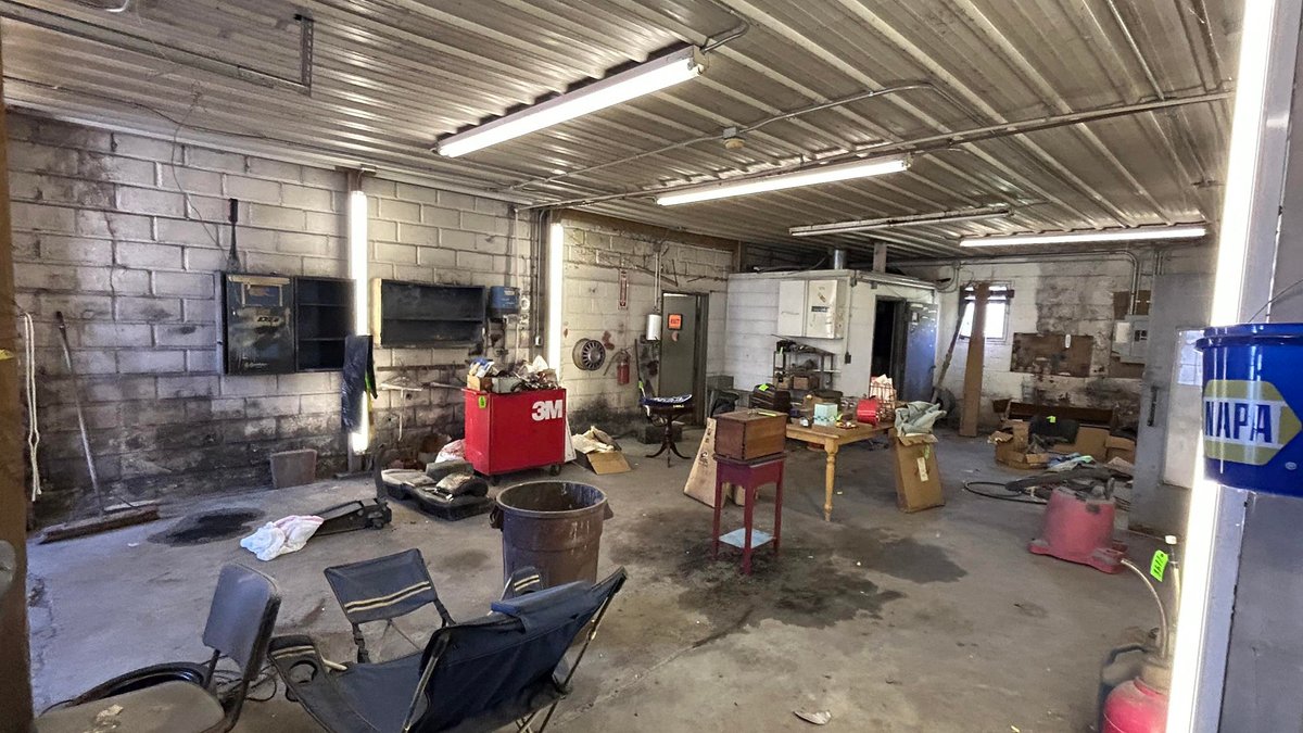 Image for SOLD $63,800 - Commercial Building with Garage Bays & Apartment Selling to the Highest Bidder